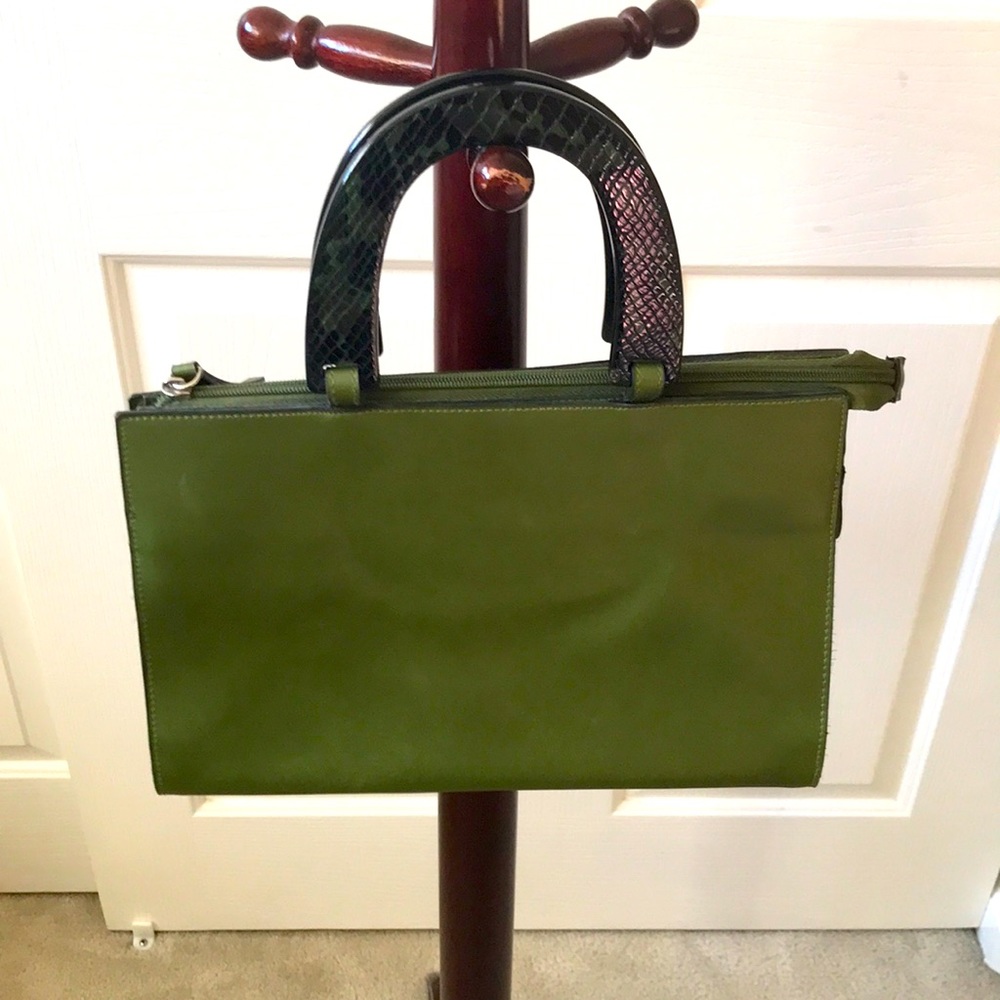 Green bag with reptile handles
